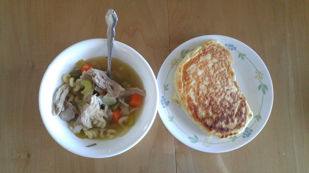 Turkey noodle soup; crumpets with butter.